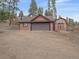 Spacious garage and separate barn provide ample parking and storage options at 11093 Milliken Ave, Conifer, CO 80433
