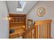 Mudroom with bench, drawers, coat hooks, shelving, and a skylight overhead at 11093 Milliken Ave, Conifer, CO 80433