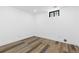 Spacious unfinished basement featuring luxury vinyl plank flooring ready for your dream design at 7596 Rafter Rd, Franktown, CO 80116