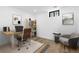 Modern home office setup with sleek desk, comfortable chair, and stylish decor for productive work at 7596 Rafter Rd, Franktown, CO 80116