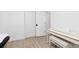 Bright room with modern piano and doors with clean and minimalist aesthetic at 7596 Rafter Rd, Franktown, CO 80116