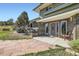 Inviting front entrance featuring a brick facade, a large front door, and stone walkway at 6227 Colorow Dr, Morrison, CO 80465