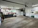 Spacious two-car garage with ample storage and work area at 6227 Colorow Dr, Morrison, CO 80465