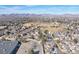 Expansive aerial view of a well-planned community showcasing the scenic mountain backdrop at 5405 S Dover St # 101, Littleton, CO 80123