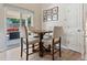 Cozy dining area with a table and four chairs, perfect for Gathering meals or casual gatherings at 17411 E Layton Dr, Aurora, CO 80015