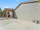 Exterior view showcasing a covered patio connected to the home with a gas line and modern siding at 17411 E Layton Dr, Aurora, CO 80015