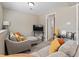 Inviting living room with comfortable seating, soft lighting, and stylish accents at 17411 E Layton Dr, Aurora, CO 80015