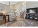 Spacious living room with an open floor plan, providing ample space for entertaining and relaxation at 17411 E Layton Dr, Aurora, CO 80015