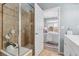 Bathroom with glass-enclosed shower and stylish decor at 601 S Fairplay St # A, Aurora, CO 80012