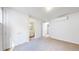 Spacious bedroom featuring a closet, adjacent bathroom, and ample natural light at 1937 S Columbine St, Denver, CO 80210