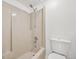 Bathroom featuring a bathtub and shower combination, as well as a low flow toilet at 6700 W 11Th Ave # 202, Lakewood, CO 80214