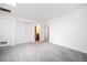 Spacious bedroom with neutral carpet, closet and ensuite access at 6700 W 11Th Ave # 202, Lakewood, CO 80214
