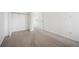 Bright bedroom with neutral carpet, closet, and natural light at 6700 W 11Th Ave # 202, Lakewood, CO 80214