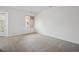 Open-concept living room with large window and natural light at 6700 W 11Th Ave # 202, Lakewood, CO 80214