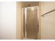 Bathroom shower with glass door and towel rack at 6700 W 11Th Ave # 202, Lakewood, CO 80214