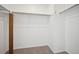 Walk-in Closet offers ample storage with multiple rods and a wooden accent support at 6700 W 11Th Ave # 202, Lakewood, CO 80214