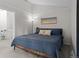Bedroom featuring a high ceiling, carpet floor and serene decor, creating a peaceful retreat at 4262 E Maplewood Way, Centennial, CO 80121