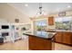 Stylish kitchen with a large center island, updated appliances, and abundant natural light at 5310 E Manchester Dr, Castle Rock, CO 80104