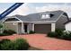 New Ranch style home with attached two-car garage and landscaping at 21935 E 51St Dr, Aurora, CO 80019