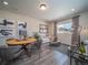 Cozy living area with modern furnishings, wood floors, and natural lighting at 21935 E 51St Dr, Aurora, CO 80019