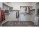 Organized walk-in closet with ample shelving and hanging space for clothes and accessories at 21935 E 51St Dr, Aurora, CO 80019
