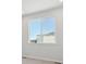 Bright bedroom featuring a large window and white walls, offering a calming and inviting space at 453 Interlocken Blvd # 104, Broomfield, CO 80021