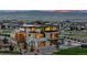 Striking modern home featuring an open design with a spacious yard and mountain views at 651 Emberglow Ln, Highlands Ranch, CO 80126