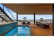 Outdoor patio featuring a hot tub, lounge chairs and seating area with views of the neighborhood at 651 Emberglow Ln, Highlands Ranch, CO 80126
