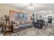 Open living room with adjacent kitchen and hardwood floors at 20572 E Girard Dr, Aurora, CO 80013