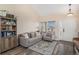 Bright living room featuring hardwood floors and comfortable seating at 20572 E Girard Dr, Aurora, CO 80013