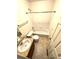 Well lit bathroom featuring a white shower-tub combo, neutral tiling, and a vanity at 55619 E 31St Ave, Strasburg, CO 80136