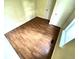 Bright bedroom with wood floor, yellow walls, and natural light from the window at 55619 E 31St Ave, Strasburg, CO 80136