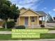 Charming single-story home featuring a well-manicured lawn, complemented by mature trees and tasteful landscaping at 55619 E 31St Ave, Strasburg, CO 80136