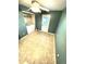 Convenient laundry area with washer, dryer, tile flooring and access to the backyard at 55619 E 31St Ave, Strasburg, CO 80136