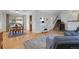 Spacious living and dining area featuring hardwood floors and neutral walls, perfect for entertaining at 4381 S Estes St, Littleton, CO 80123