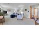 Cozy living room with neutral walls, and a comfortable sofa, creating a relaxing atmosphere at 4381 S Estes St, Littleton, CO 80123