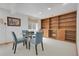 Recreational room with a chess table, and built-in bookshelves, ideal for entertaining and storage at 4381 S Estes St, Littleton, CO 80123