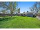Spacious backyard with lush green lawn and patio, perfect for outdoor entertaining and relaxing at 4530 S Pennsylvania St, Englewood, CO 80113