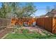 Backyard patio with landscaping, a privacy fence, and outdoor seating at 4530 S Pennsylvania St, Englewood, CO 80113