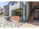 Charming exterior showcasing brick accents and convenient stairway access to upper level at 12047 E Harvard Ave # 103, Aurora, CO 80014