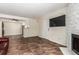 Open-concept living room featuring stylish tile flooring and lots of natural light at 12047 E Harvard Ave # 103, Aurora, CO 80014