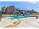 Community pool surrounded by lush greenery, providing a refreshing and relaxing outdoor amenity for residents at 12047 E Harvard Ave # 103, Aurora, CO 80014