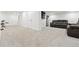 Finished basement with cozy reclining sofa, offering a versatile space for relaxation and entertainment at 5926 S Jellison St # B, Littleton, CO 80123