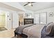 Inviting bedroom with hardwood floors and natural light, featuring a decorative fireplace at 5926 S Jellison St # B, Littleton, CO 80123
