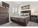 Cozy main bedroom with neutral bedding, and minimalist decor at 5926 S Jellison St # B, Littleton, CO 80123