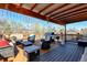 Spacious back deck furnished with a grill and seating area, ideal for outdoor gatherings at 7970 Wolff Ct, Westminster, CO 80030
