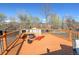 Wooden deck with a built-in bench and outdoor seating area with black iron railing, perfect for enjoying the outdoors at 7970 Wolff Ct, Westminster, CO 80030