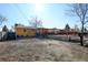 Backyard showcasing an expansive yard, deck, and exterior of the house at 7970 Wolff Ct, Westminster, CO 80030