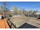 Spacious backyard featuring a wooden fence, gravel, and room for outdoor activities at 7970 Wolff Ct, Westminster, CO 80030