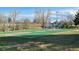 Community basketball court with playground and blue slides offers recreational opportunities for residents at 7970 Wolff Ct, Westminster, CO 80030